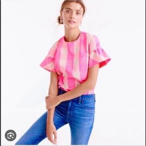 J-Crew pink plaid blouse with ruffle sleeves.